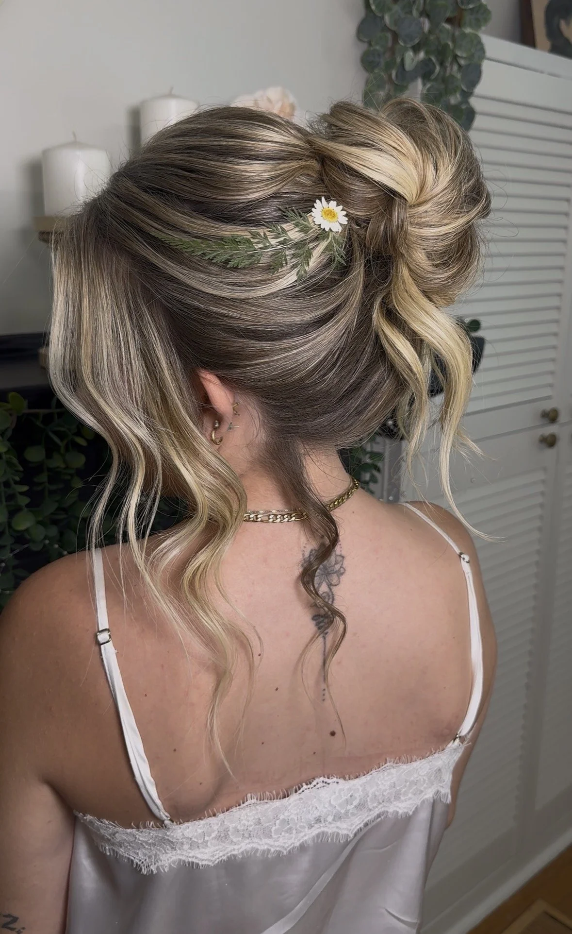Soft textured bridal updo with natural movement