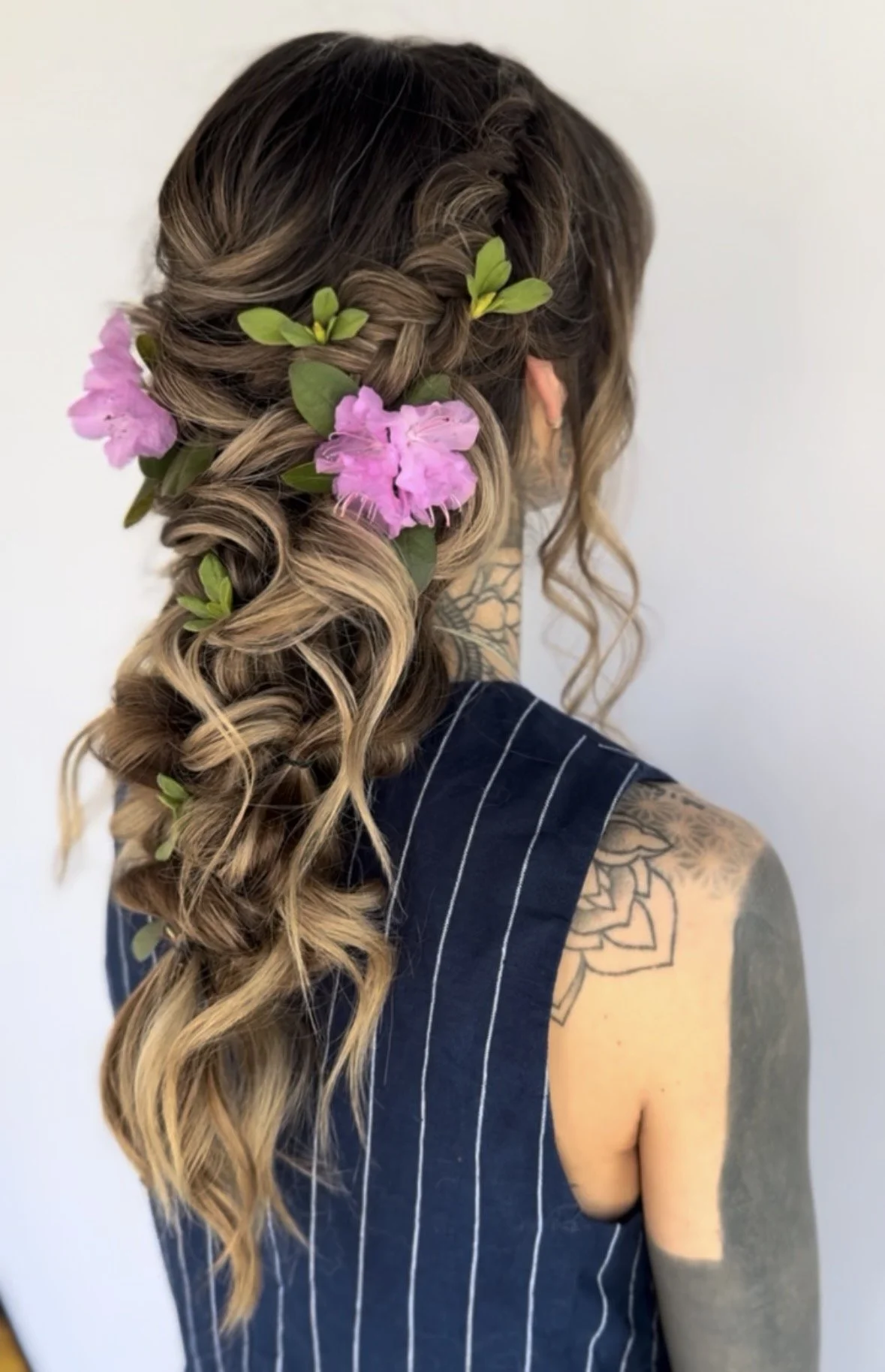 A relaxed bridal look accented with florals for an organic, bohemian feel.