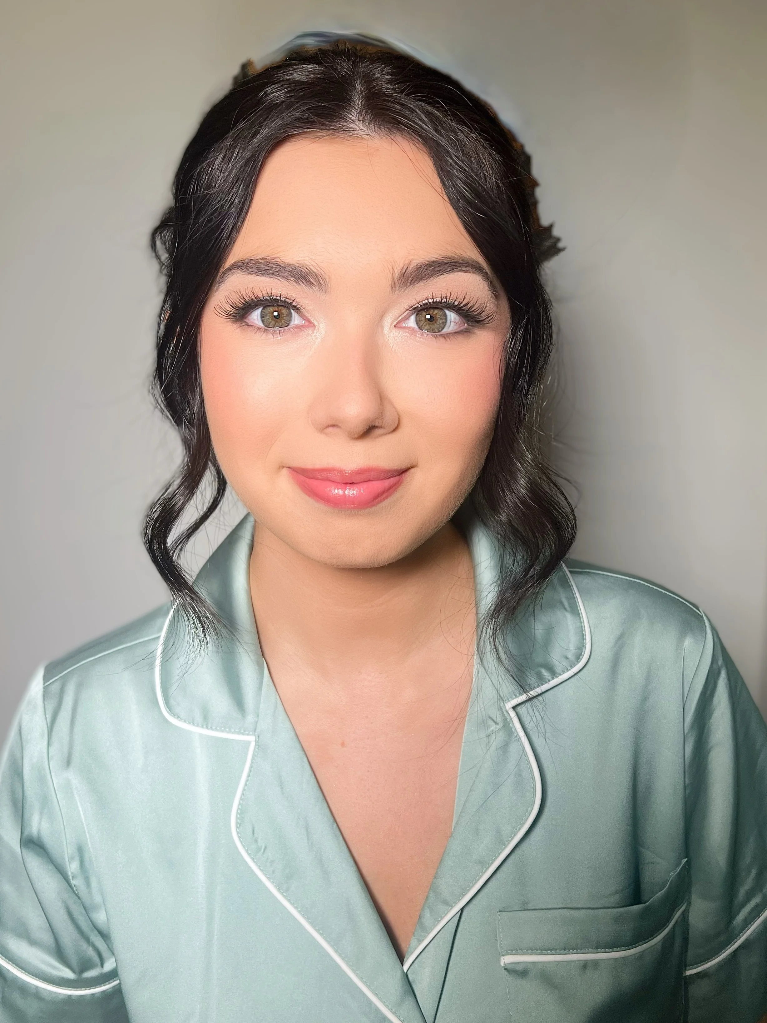 Soft glam makeup that enhances natural features with a fresh, radiant finish.