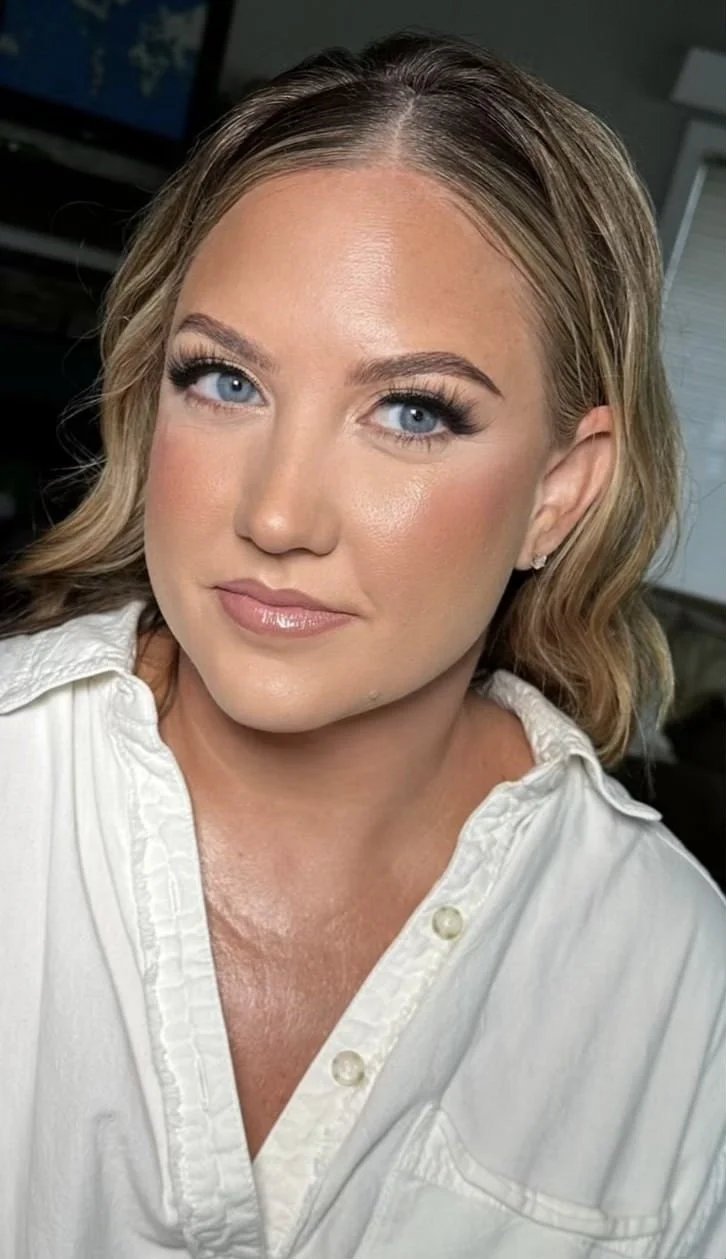 Natural glam makeup focused on skin, subtle contour, and effortless polish.