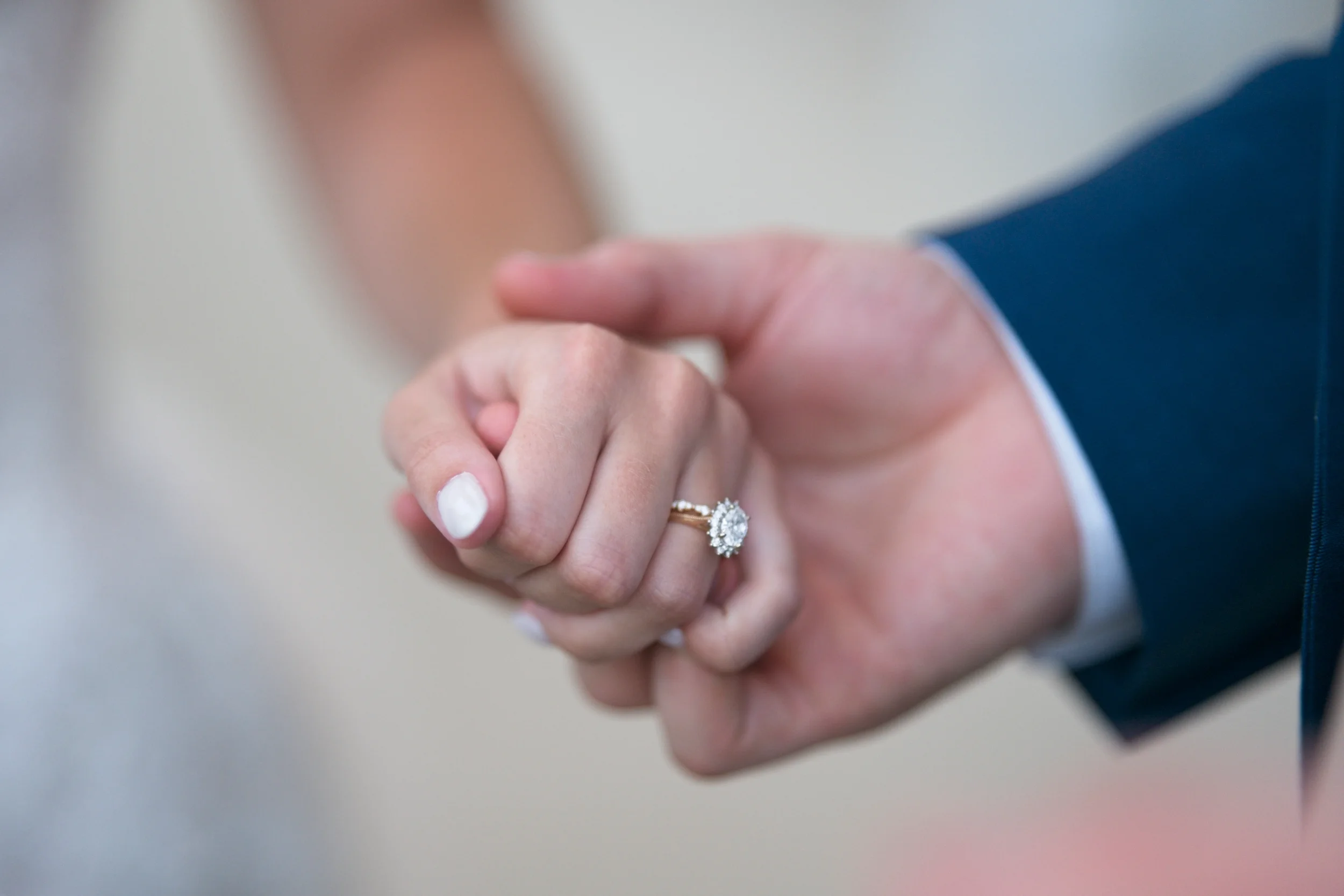 Husband holding her wifes hand