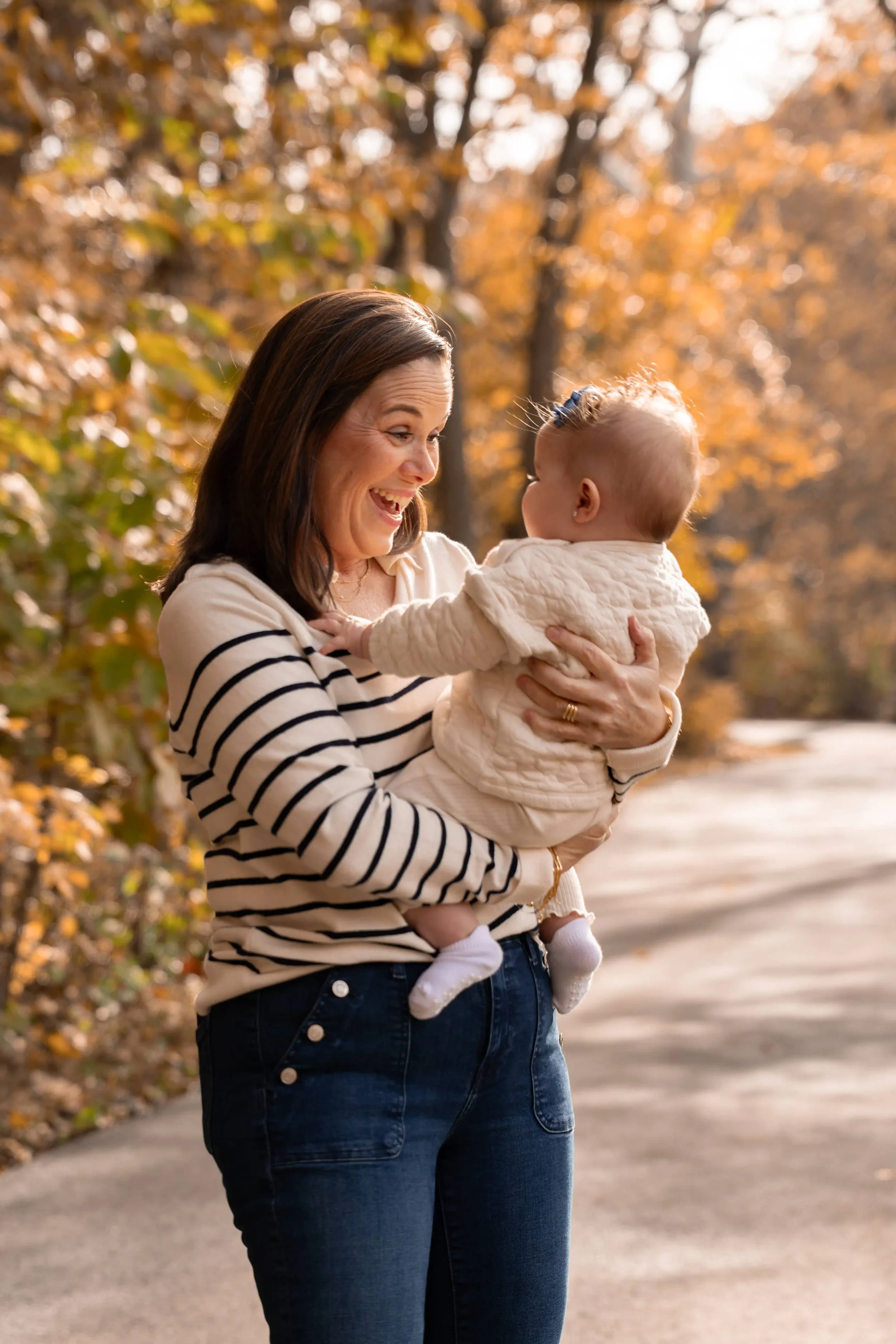 Grandma adorning baby 