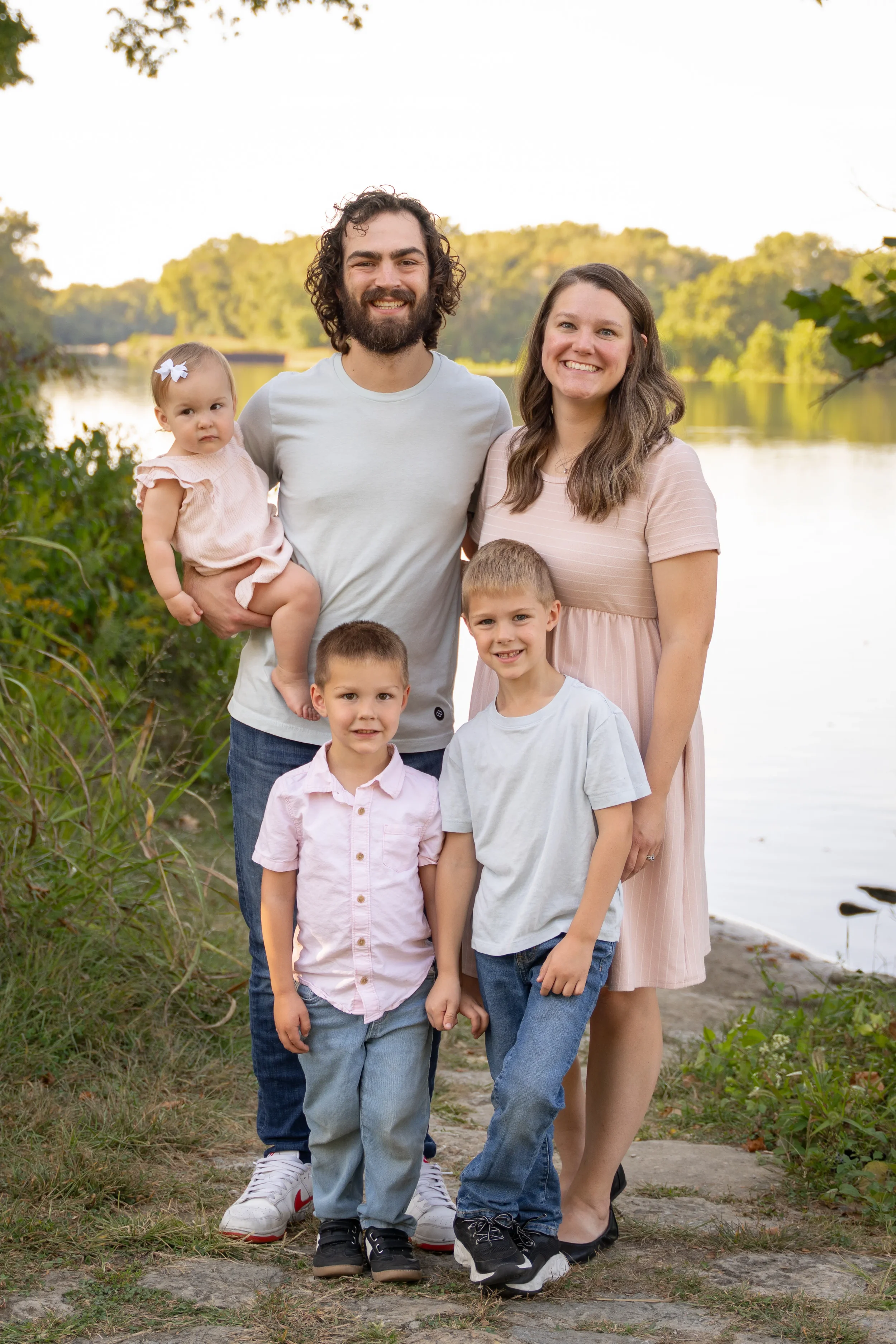 Standard family portrait near lake