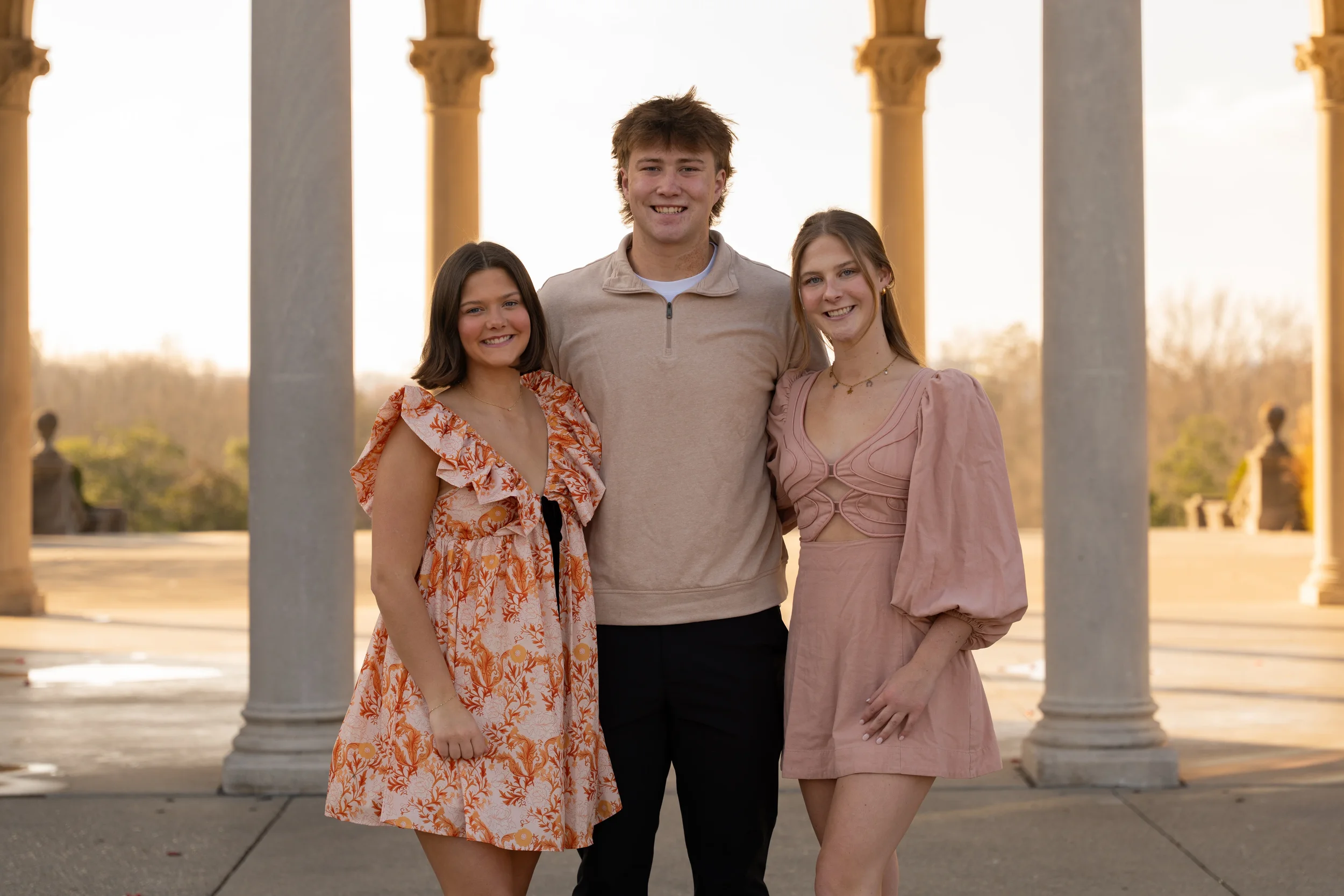 Sibling photos smiling in park