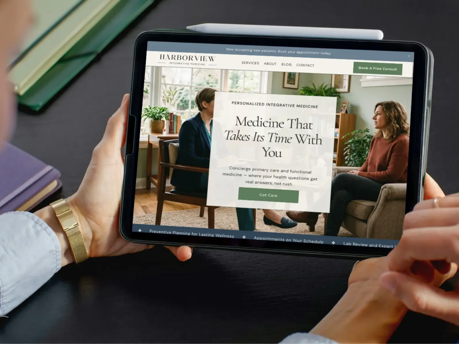 A tablet displaying a Squarespace website for an integrative medicine practice, designed by Open Tree Creative in Concord, NH