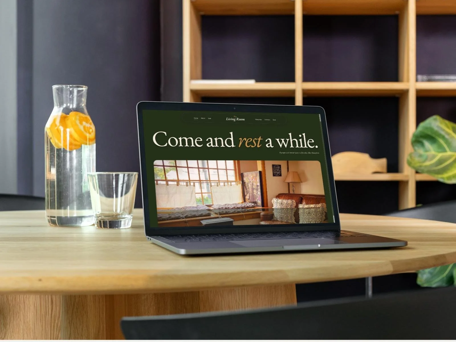 A laptop displaying The Living Room website, designed by Open Tree Creative in Concord, NH