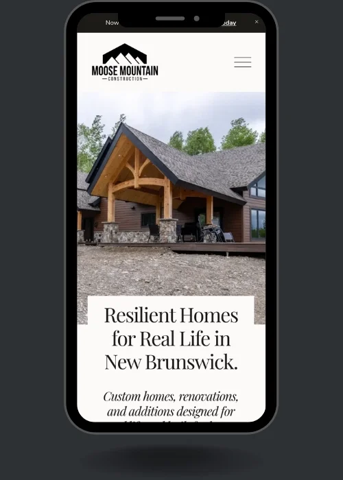 Website design for Moose Mountain Construction in Hartland, New Brunswick displayed on mobile phone.