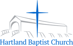 Outline of Hartland Baptist Church with a central blue cross above the name