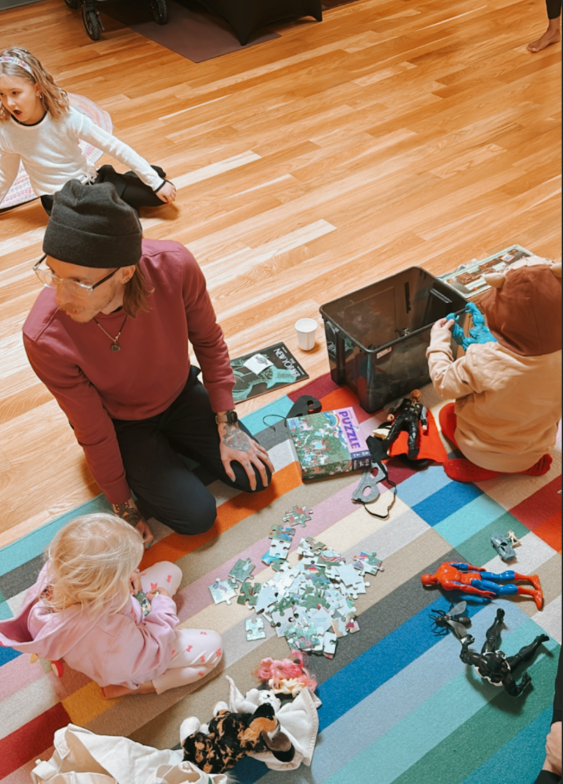 briar on floor with kids is.png