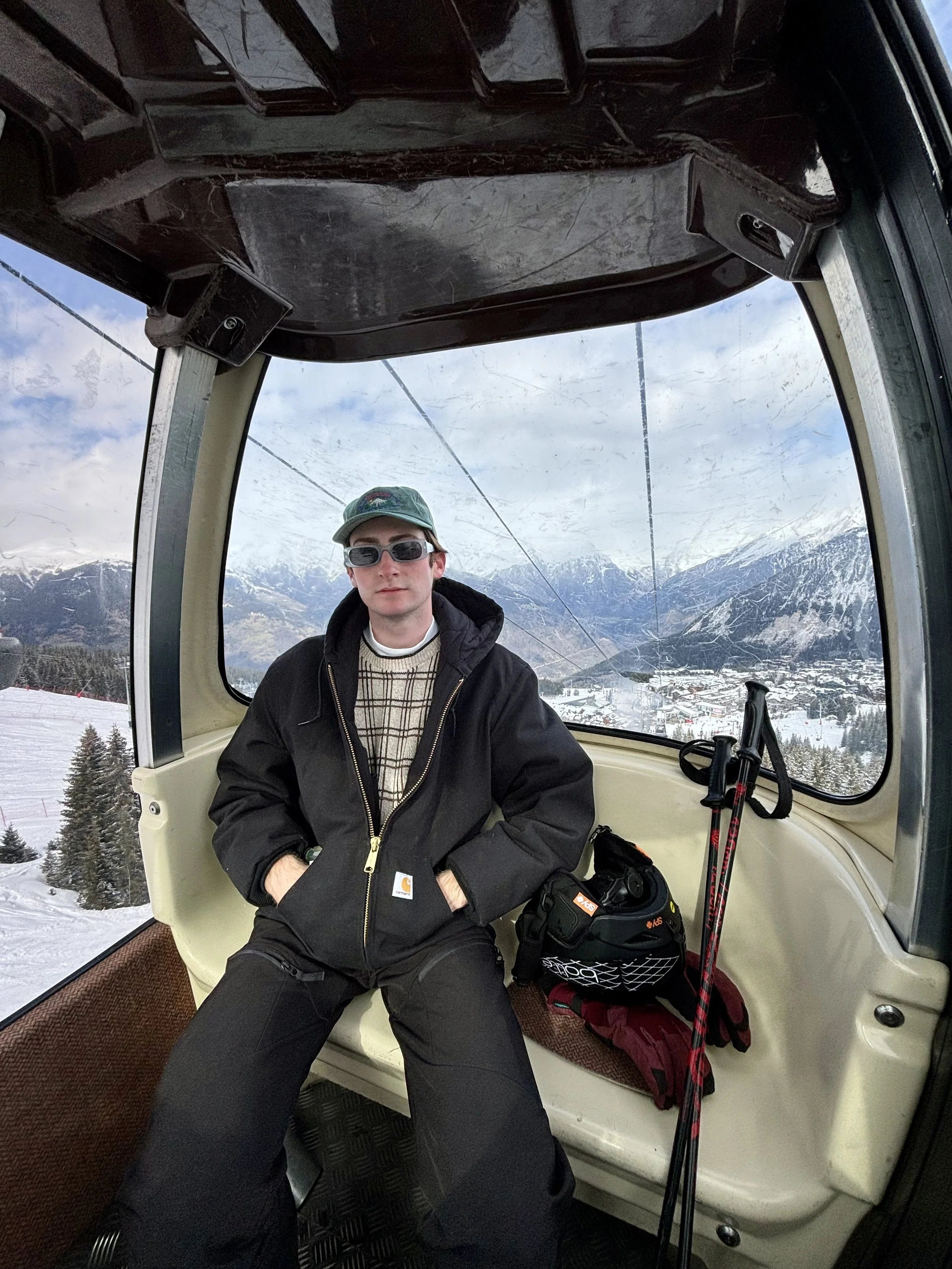 Me riding up a gondola.