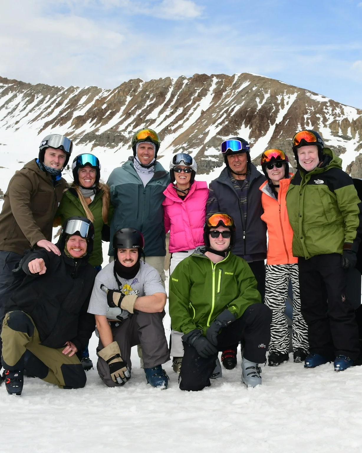 The whole family crew posing on the mountain.