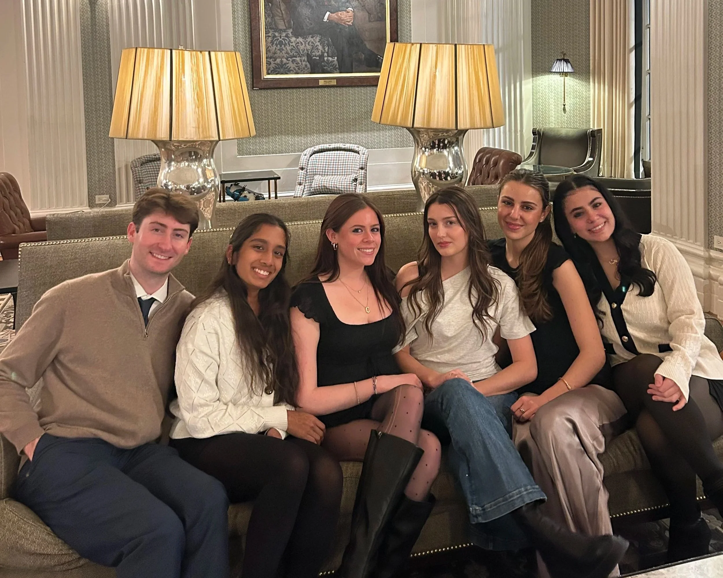 My friends and I posing on a couch at The Yale Club.
