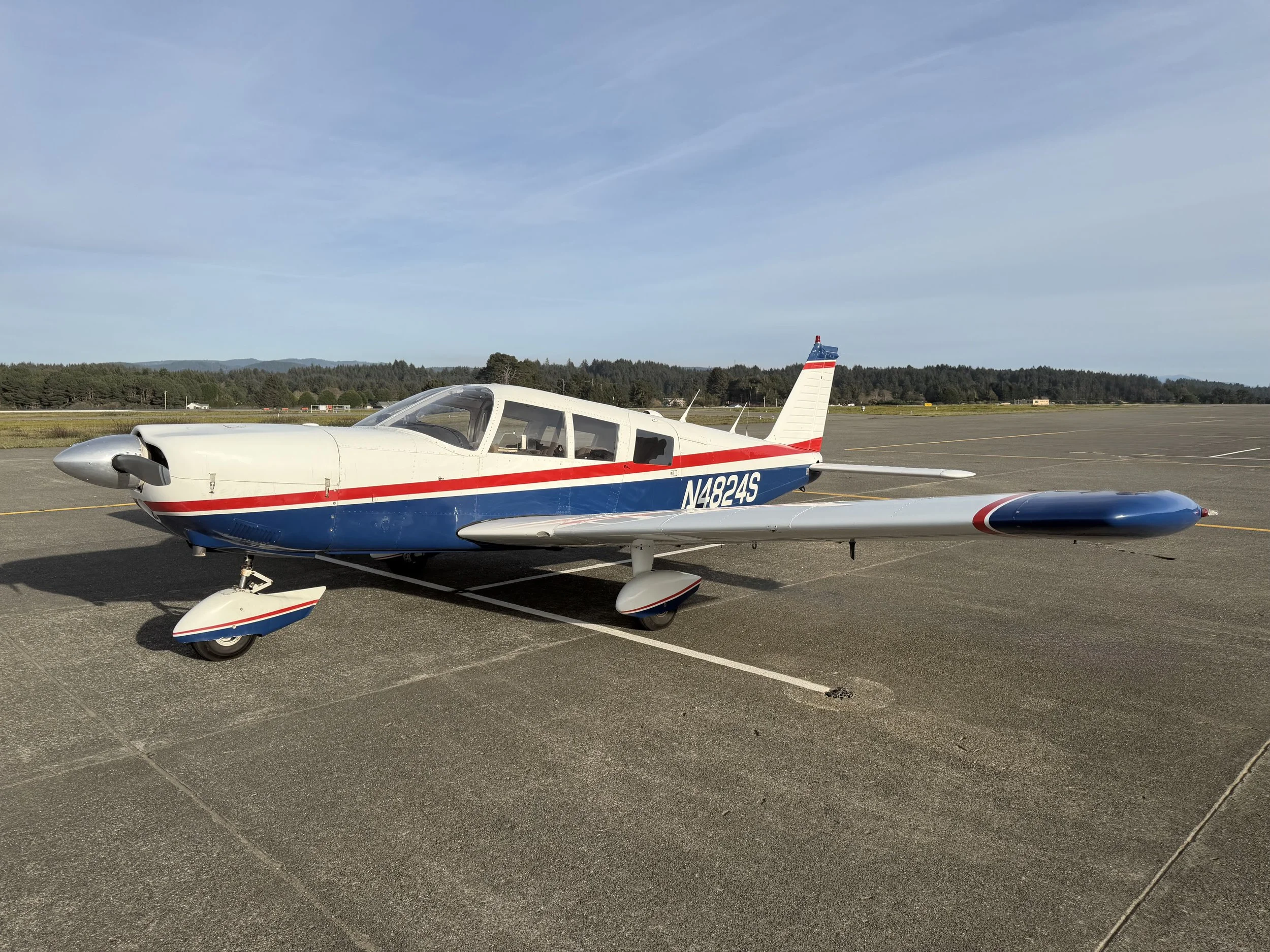 Piper Cherokee Six N4824S parked on the ramp, used for private, instrument, and commercial training at Mesa Gateway Airport (KIWA)