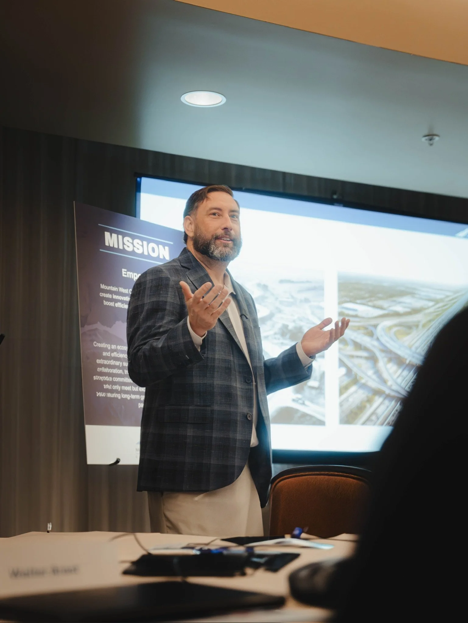 Owner presenting the Mission of the company to his employees