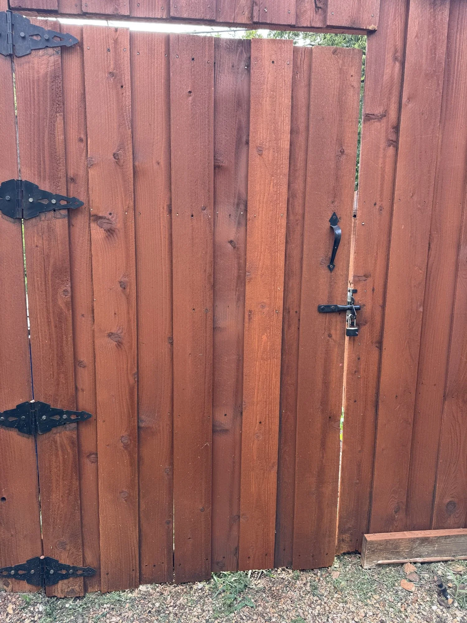 The same gate rebuilt and finished with oil-based stain, Dallas