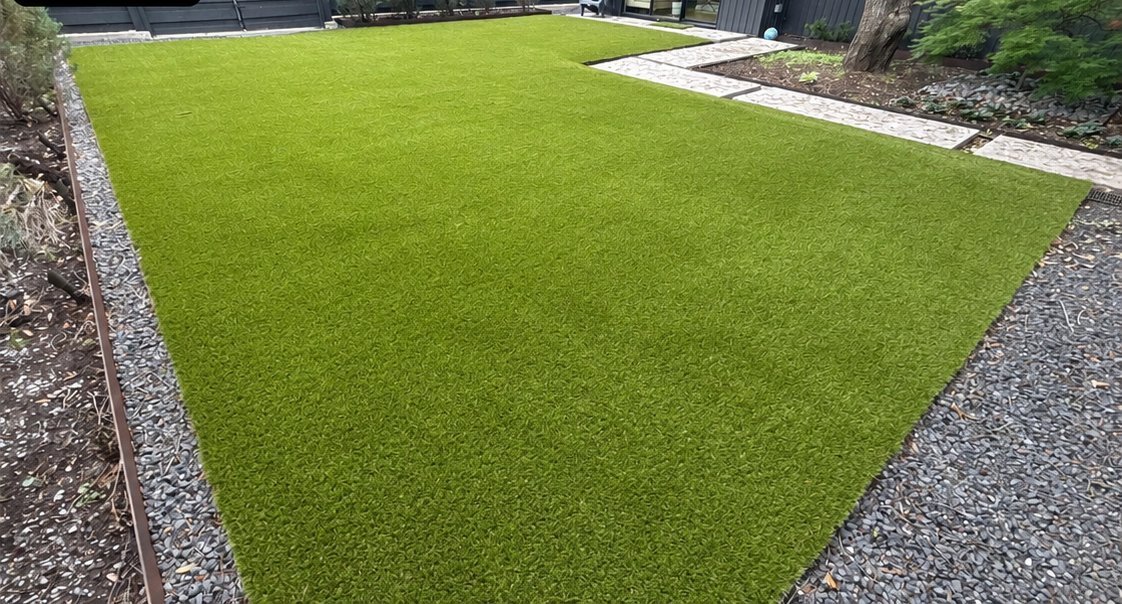 The same East Dallas artificial turf clean and standing tall after Spotlite's power-broom deep cleaning
