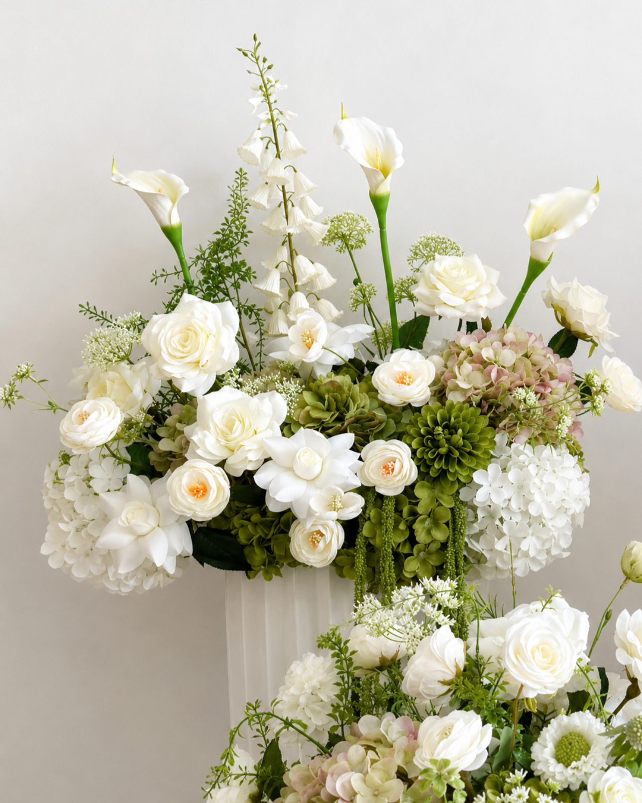 Lillian Meadows- 12 available, 12 centerpieces, and 1 split arch