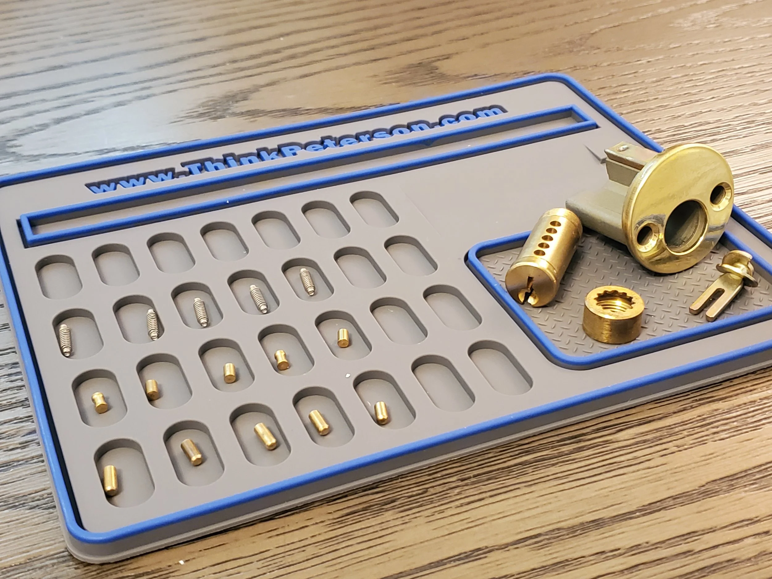 Pinning mat and lock owned by JWP Locksmithing LLC in Coos Bay, Oregon.