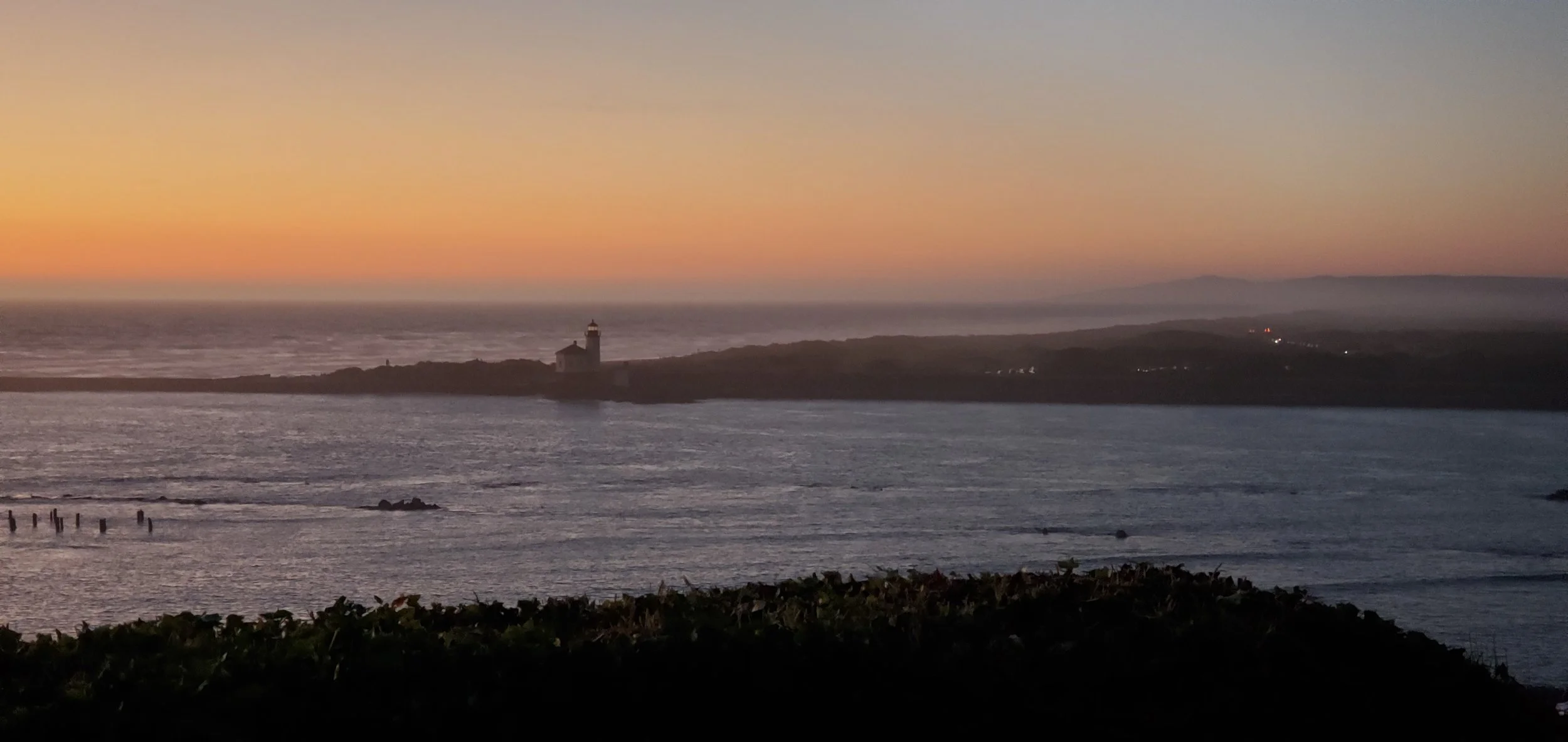 Coquille Lighthouse and Coquille River in Bandon, Oregon.