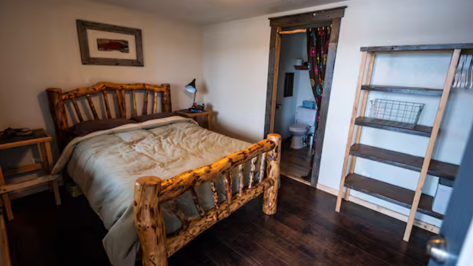 This is room sleeps two and features a queen size bed and a full bath with step in shower. The private room has a direct view of the lake.