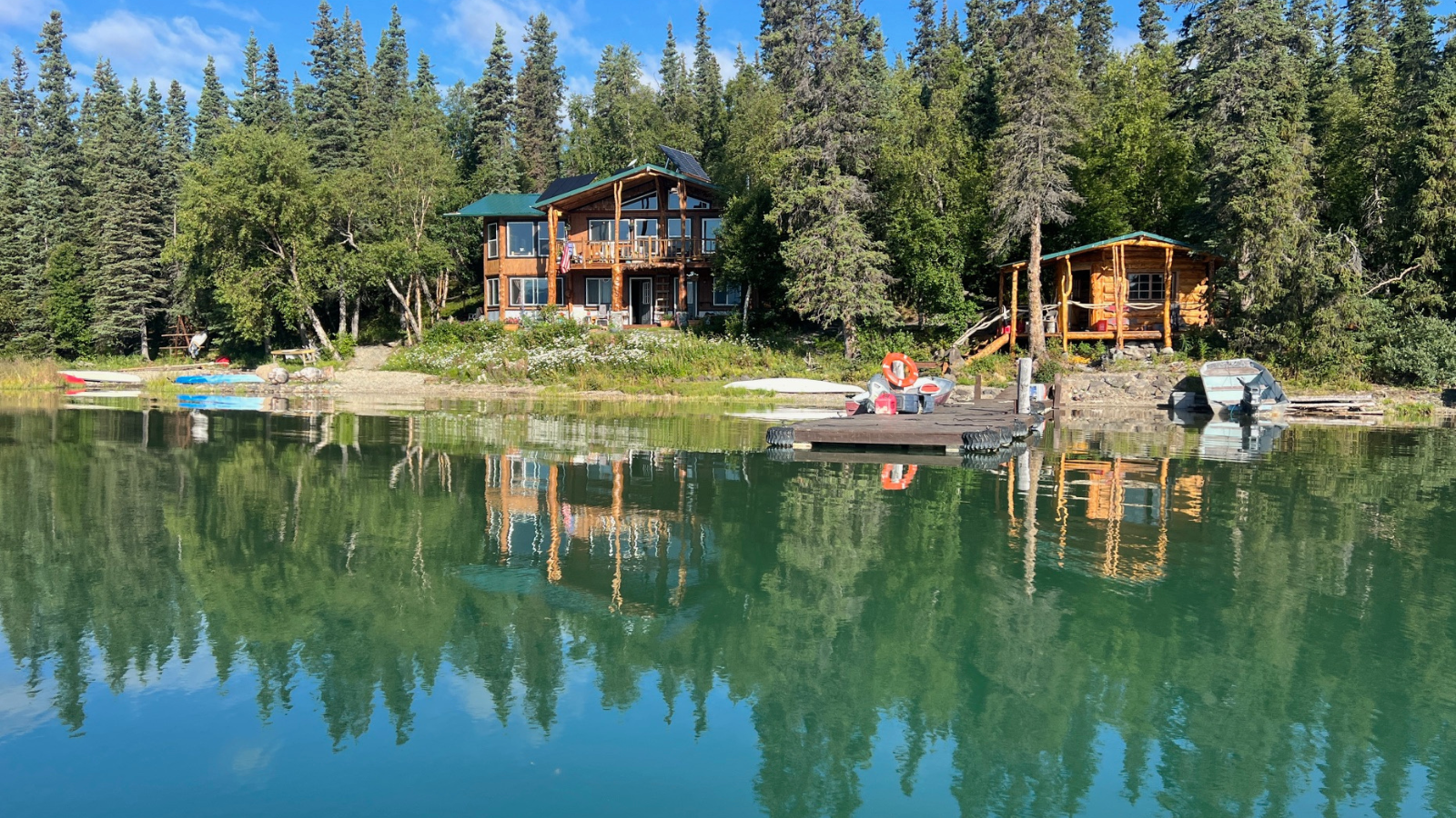 View from the front of the lodge. The Apartment, Dry Cabin, Sauna and Hot Tub are behind the trees to the left. 