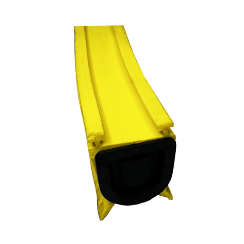 A yellow speed bump with black rubber part on the bottom, designed for traffic calming.