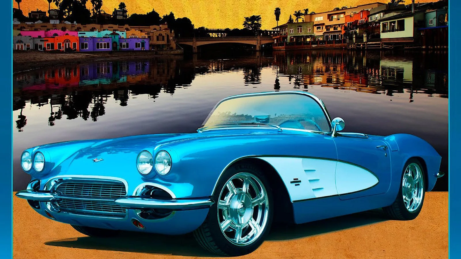 A vintage blue convertible sports car parked on a sandy surface near a water body, with colorful houses and trees in the background during sunset.