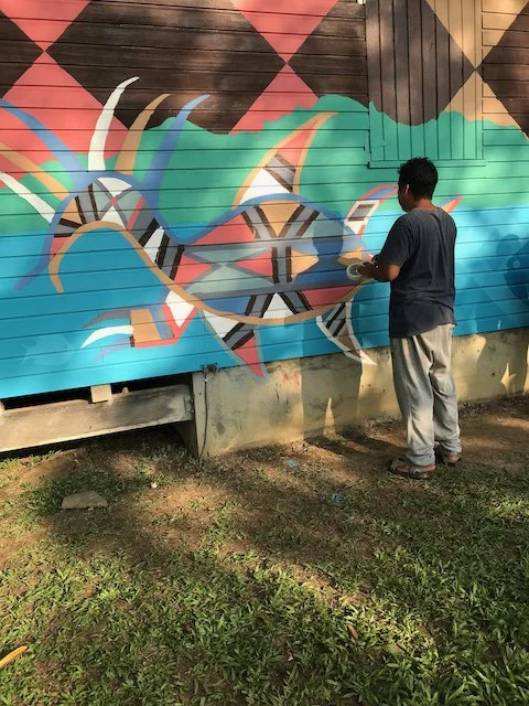 Ministelli peignant un "molokot", monstre mythique.