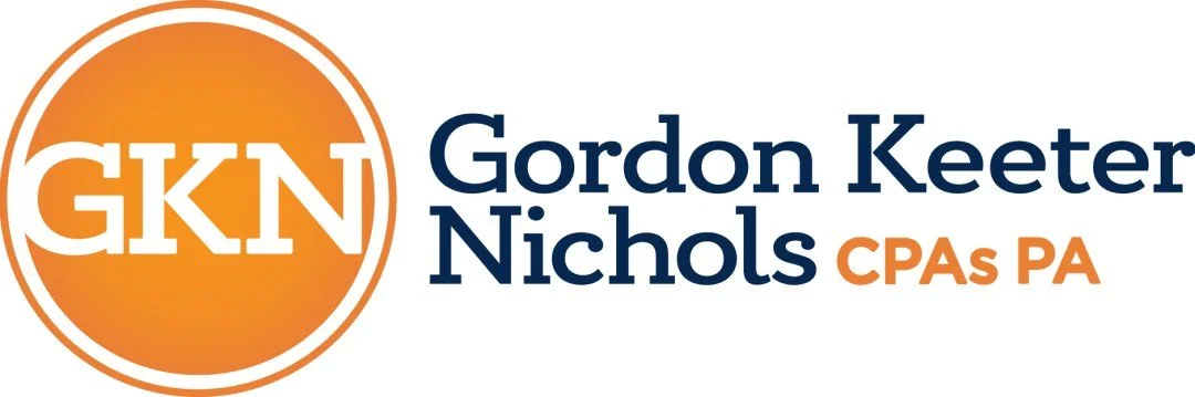Logo with orange circle and white text 'GKN', next to text 'Gordon Keeter Nichols CPAs PA' with 'CPAs PA' in orange.