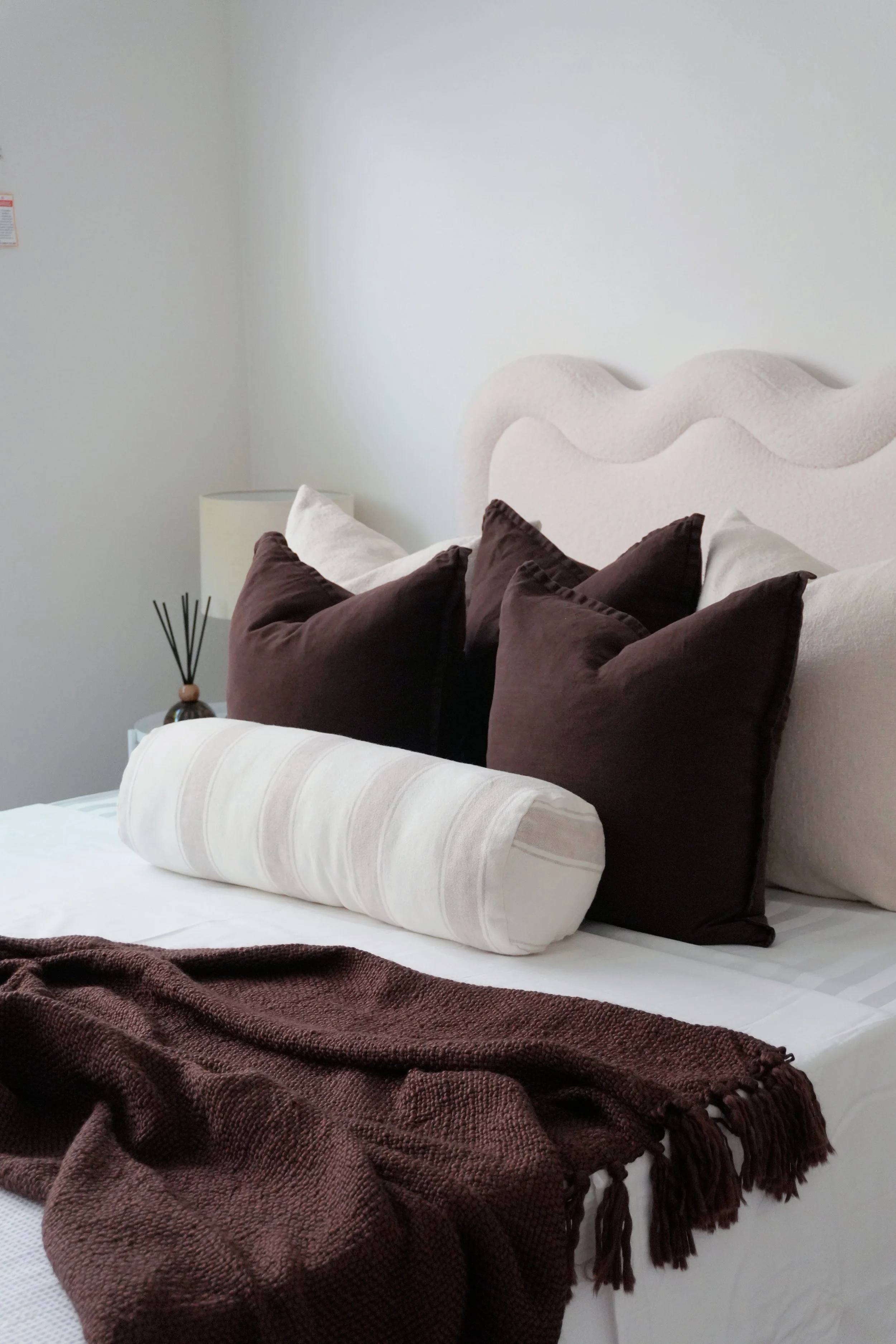 Drummoyne | This bedroom was designed as a calm and restorative retreat using soft tonal layering, tactile textures, and understated styling details. The neutral palette enhanced natural light while creating a refined and aspirational atmosphere for 