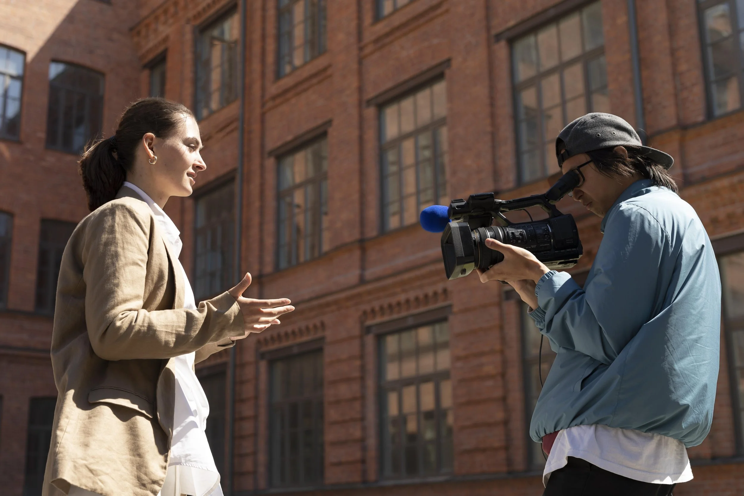 female-journalist-telling-news-outdoors.jpg