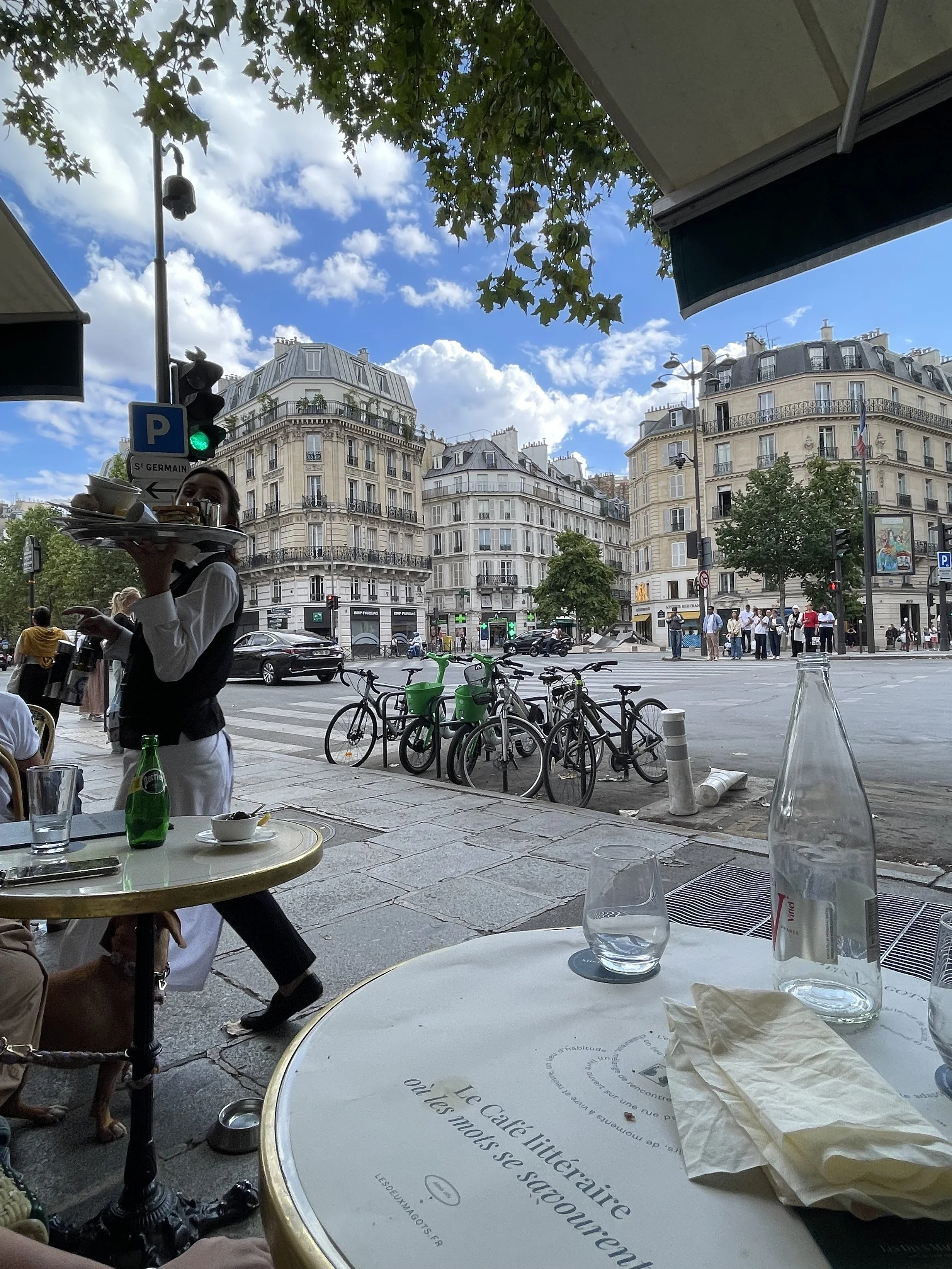 Sidewalk table at Les Deux Magots looking out over Saint-Germain-des-Prés in Paris