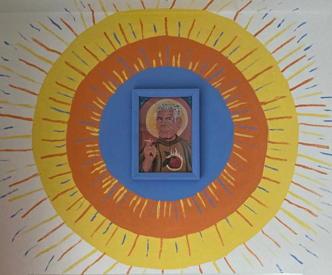 Man in center of circular art piece