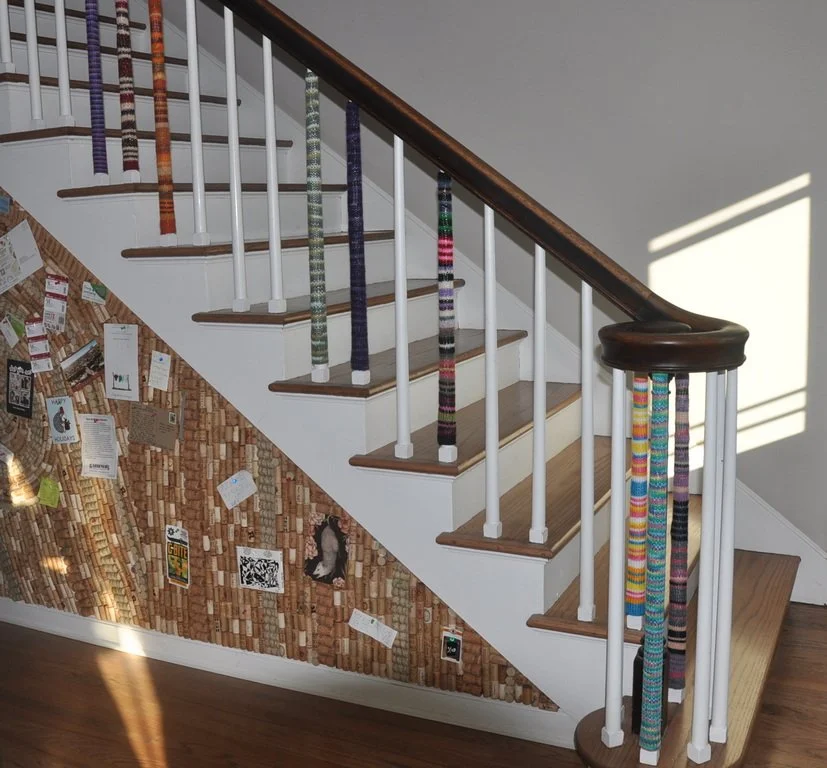 Art going up staircase in house