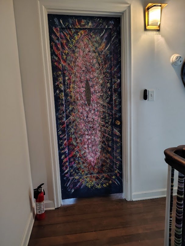 Art as door in house with light