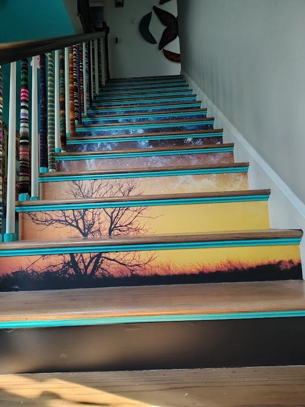 Tree mural on staircase