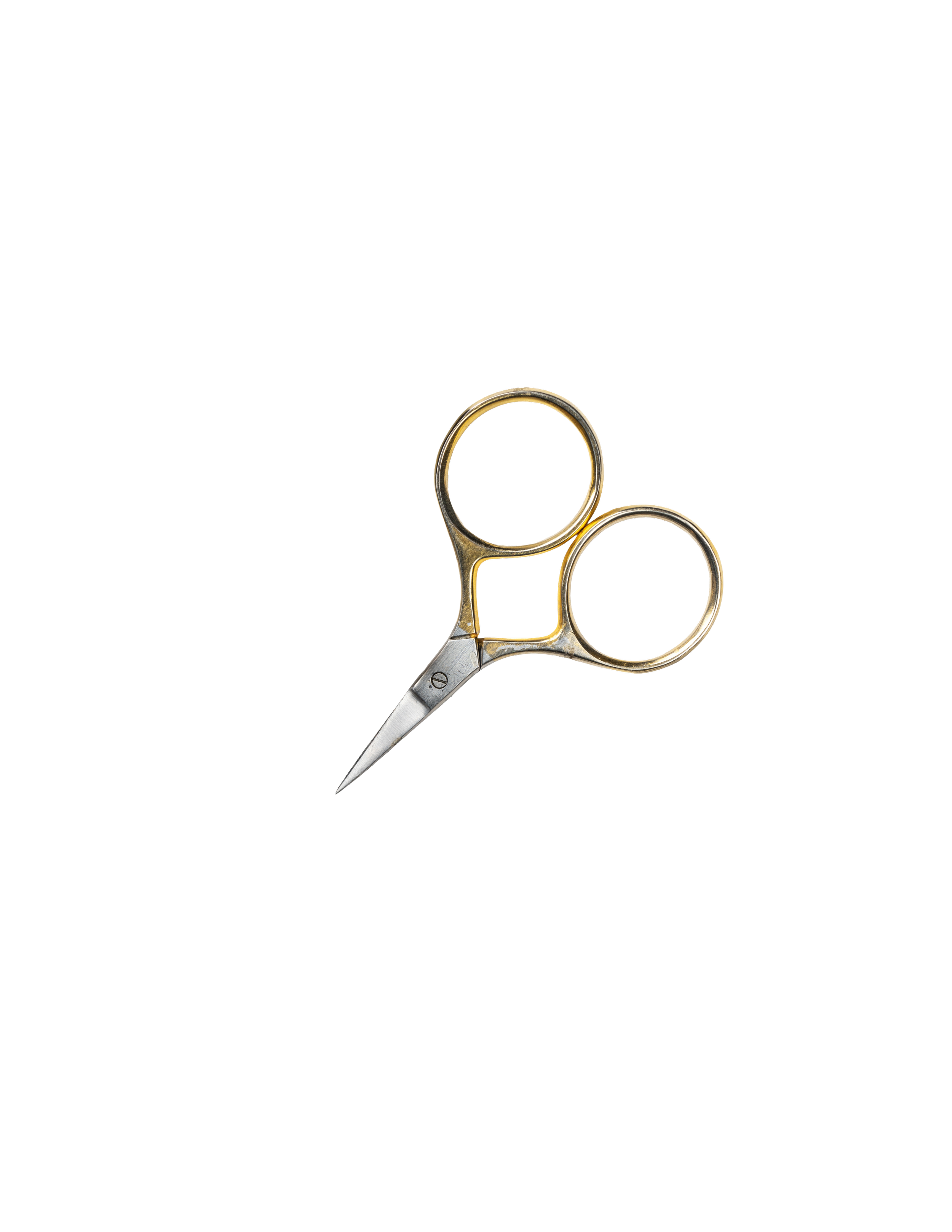 Pair of gold scissors with black handles against black background, positioned over a gray bar with a blue stripe.