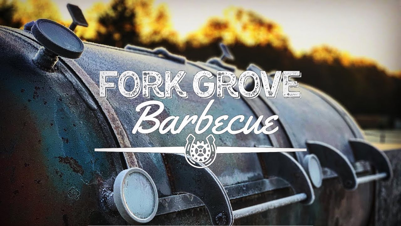 A close-up of a large, rusted barbecue smoker grill outdoors at sunset, with the text 'Fork Grove Barbecue' overlaid.