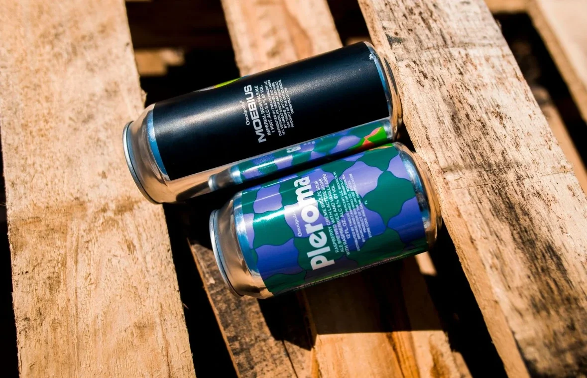 Craft beverage cans on distribution pallets.