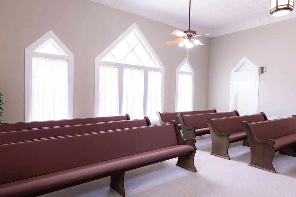 Pews inside the Normangee Church of Christ auditorium where our warm and friendly Christian family gathers.