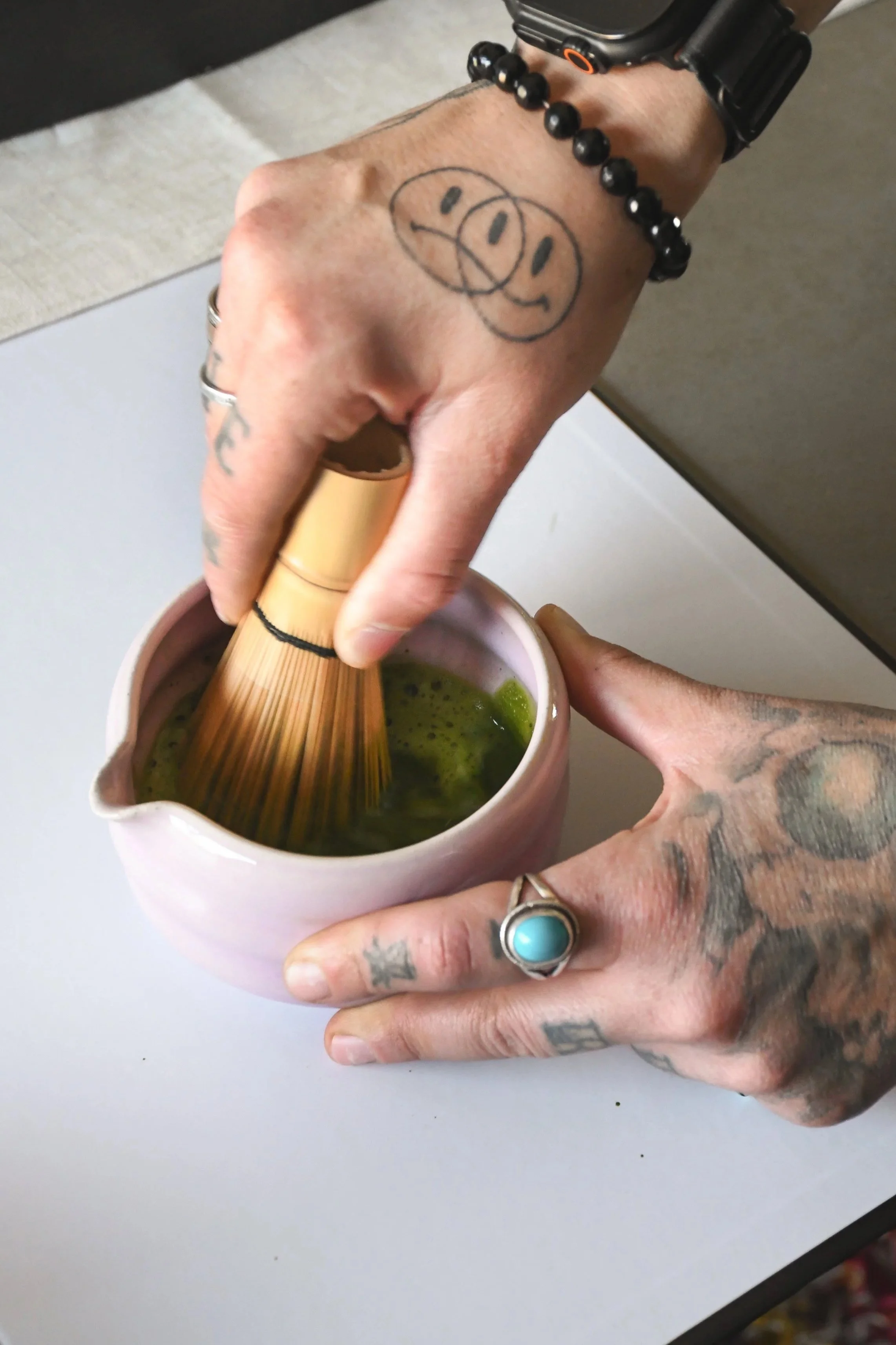 Professional matcha catering for Milwaukee film sets. Ceremonial grade matcha prepared with a bamboo whisk for high-end production crews and creative studios.