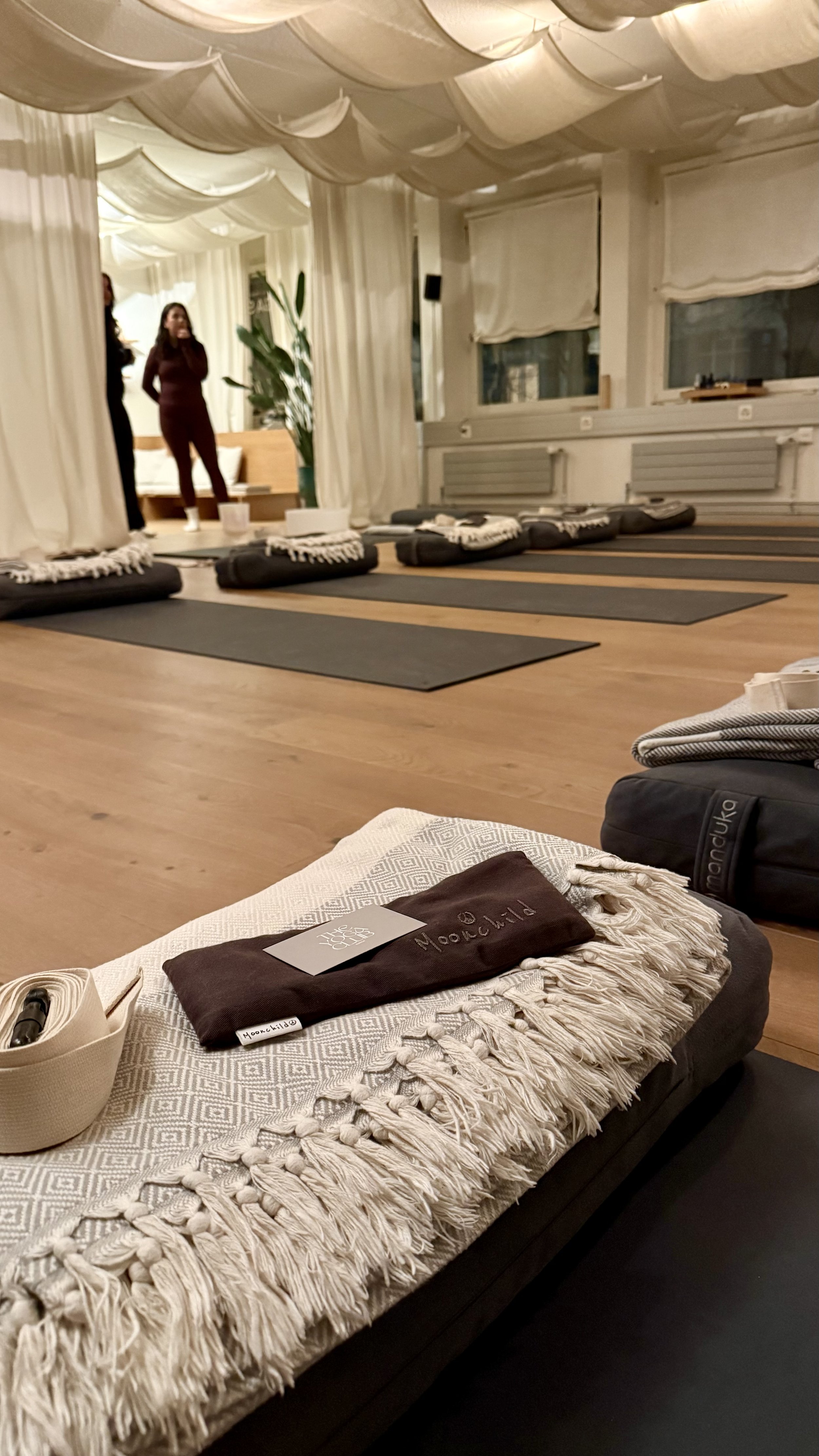 Showing yoga mats and yoga strap