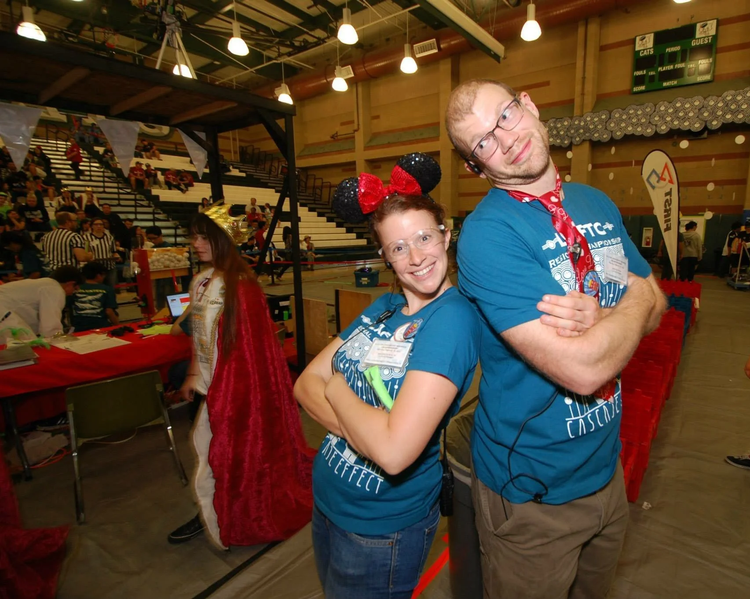 Maggie Scholtz and a fellow volunteer at a FIRST robotics event