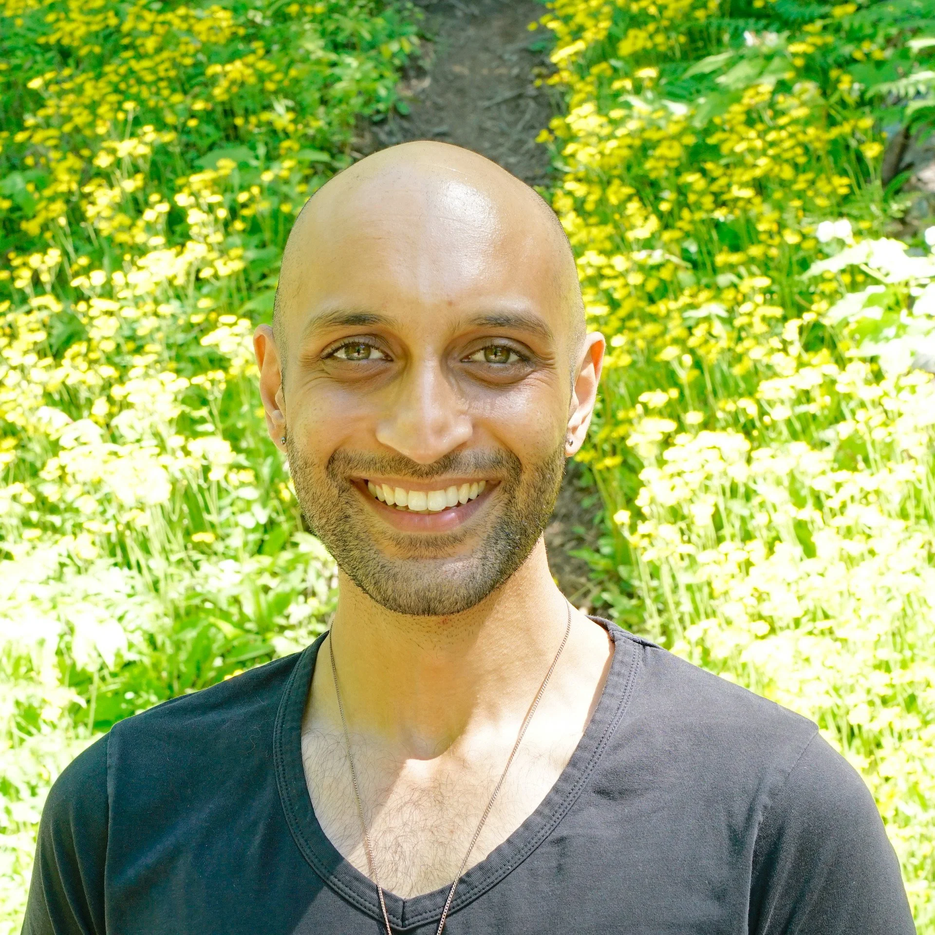 Meditation teacher based in Hampshire standing outdoors in natural setting