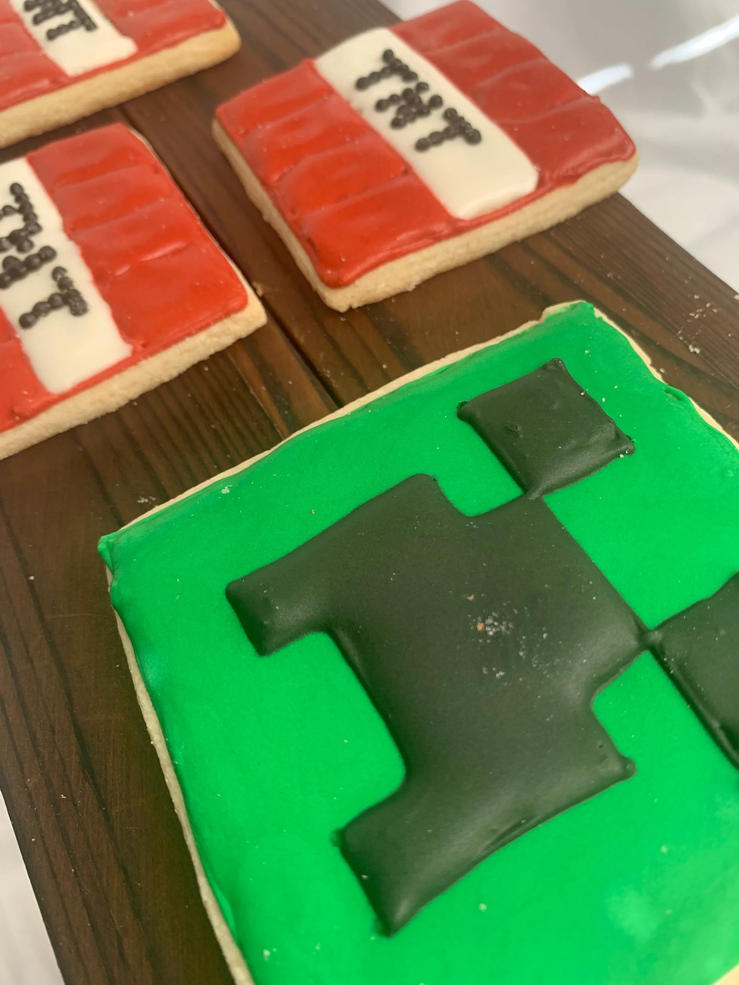 S&S 2025 pixel game cookies with dynamite and creep.jpeg