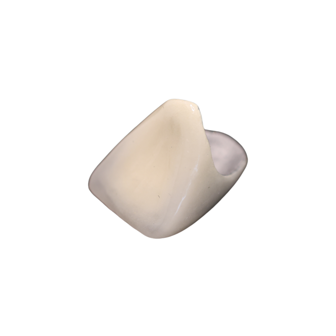 A piece of white chewing gum with a small hole in the side.
