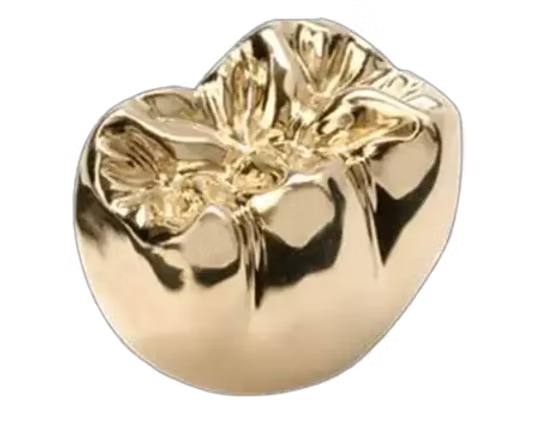 A shiny, gold-colored metallic heart-shaped object with a smooth, reflective surface.