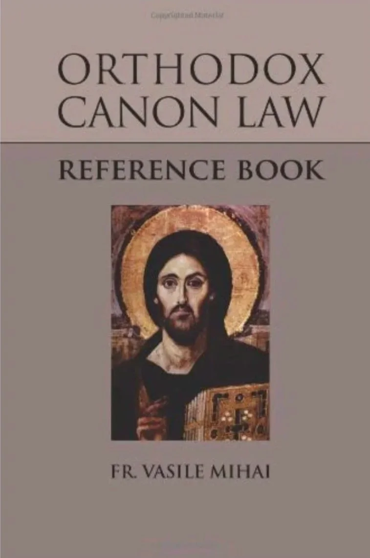 Book cover titled 'Orthodox Canon Law Reference Book' by Fr. Vasile Mihai, featuring an icon of Jesus Christ with a golden halo.