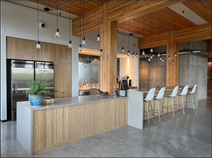 Close-up of stacked and cut pieces of plywood or laminated wood panels.