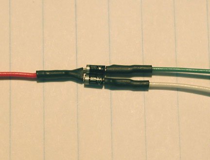 (B)  Add heat-shrink over solder joints